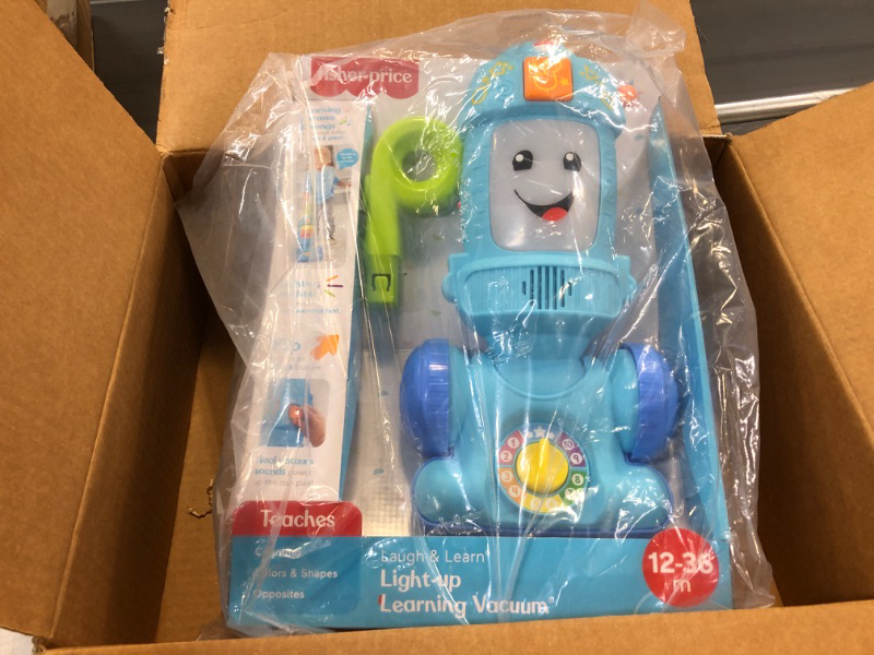 Photo 1 of Fisher-Price Laugh & Learn Toddler Toy Vacuum, Push Toy with Lights Music and Educational Songs, Light-Up Learning