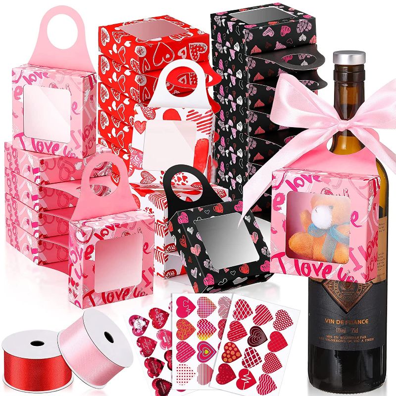 Photo 1 of 36 Pcs Valentine's Day Wine Bottle Box with Window Hanging Foldable Gift Boxes Bottle Hanger Favor Box Wine Boxes for Gifts with Red Pink Satin Ribbon and Heart Stickers for Party (Square Window)
