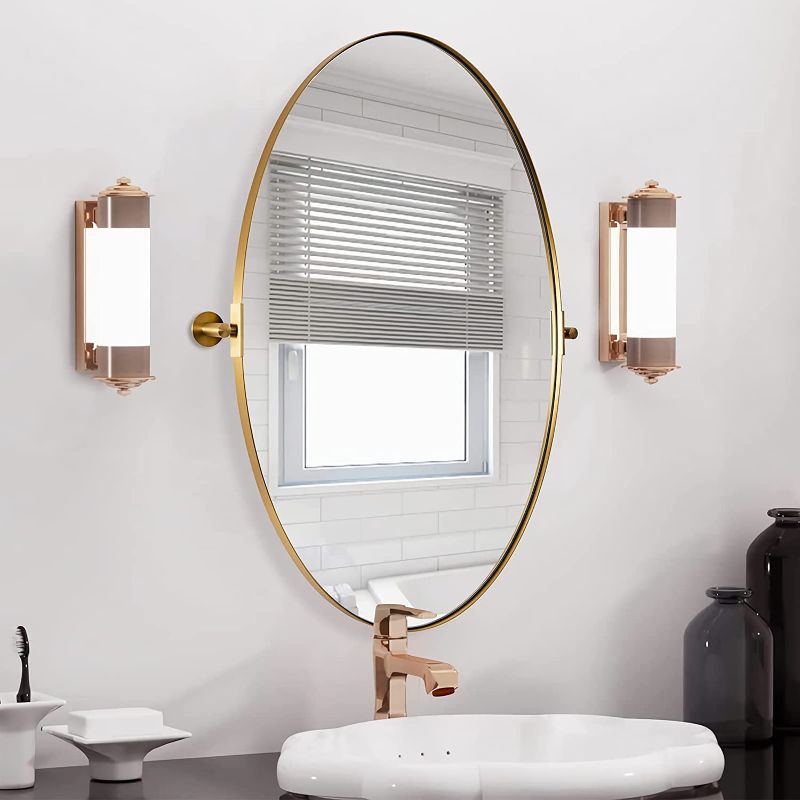 Photo 1 of ANDY STAR Gold Oval Mirror, Oval Pivot Bathroom Mirror, Brushed Gold Oval Pivot Mirror Bathroom Stainless Steel Metal Frame Tilting Vanity Wall Mirror Hangs Vertical
