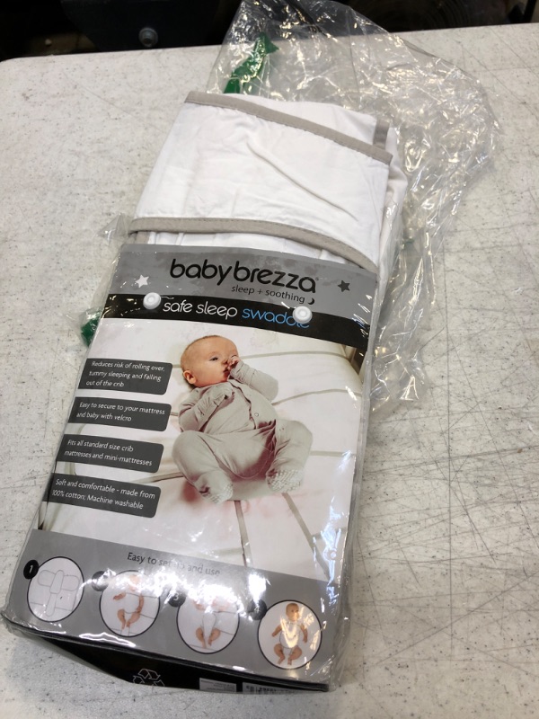 Photo 2 of Baby Brezza Safe Sleep Swaddle Blanket for Crib Safety for Newborns and Infants – Safe, Anti-Rollover Blanket in White, by Tranquilo Reste