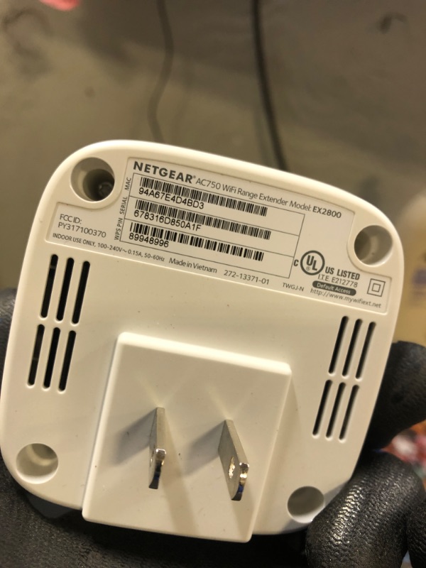 Photo 1 of NETGEAR WiFi Range Extender EX2800 - Coverage up to 1200 sq.ft. and 20 Devices, WiFi Extender AC750