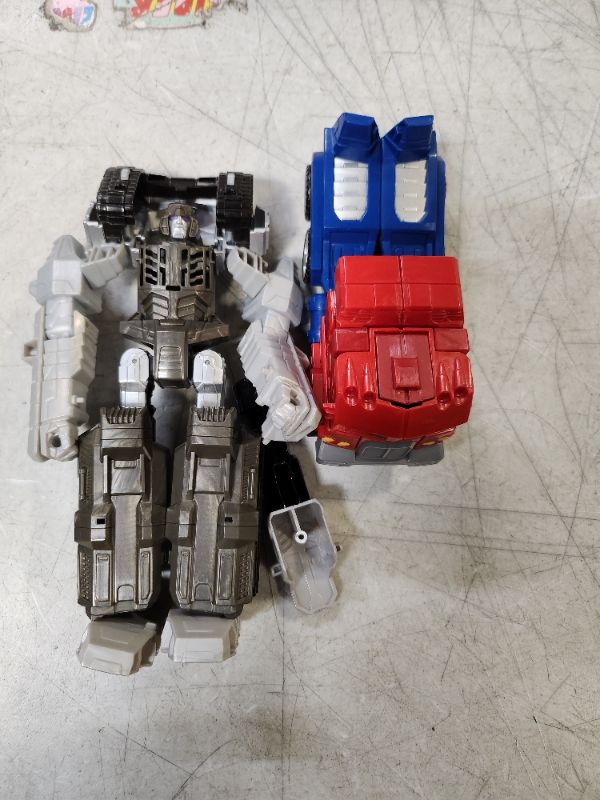 Photo 2 of Transformers Toys Heroes and Villains Optimus Prime and Megatron 2-Pack Action Figures - for Kids Ages 6 and Up, 7-inch (Amazon Exclusive)