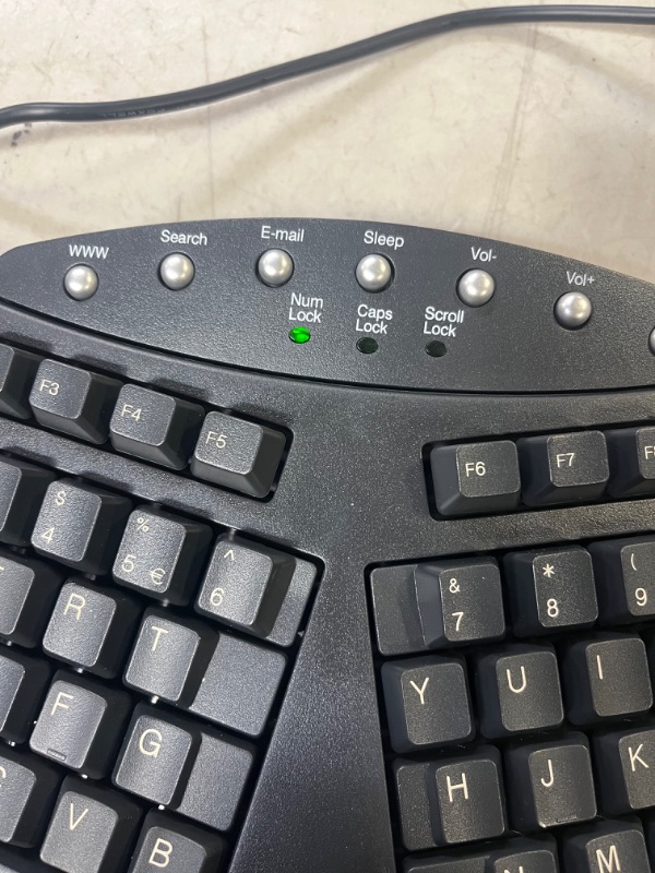 Photo 3 of Perixx Periboard-512 Ergonomic Split Keyboard - Natural Ergonomic Design - Black - Bulky Size 19.09"x9.29"x1.73", US English Layout Wired Black Keyboard