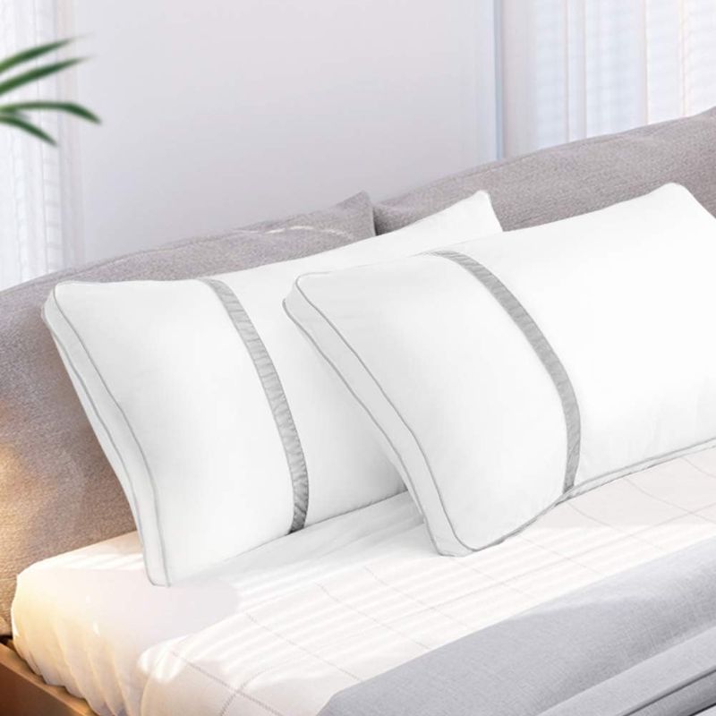 Photo 1 of 2 white ful size pillows