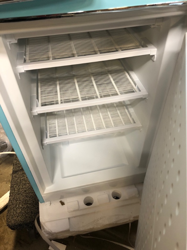 Photo 3 of Galanz  Retro Bottom Mount Refrigerator, Adjustable Mechanical Thermostat with True Freezer, Blue, 7.4 Cu Ft HAS A SMALL DENT ON BACK SIDE ON BOTTOM 
