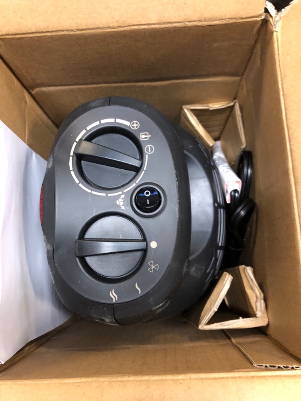 Photo 1 of Amazon Basics 1500W Oscillating Ceramic Heater with Adjustable Thermostat, Black Black Heater with Oscillating