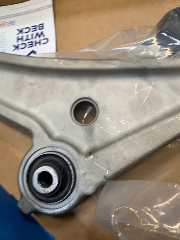 Photo 5 of BECKARNLEY 102-7757 Control Arm with Ball Joint --- Box Packaging Damaged, Moderate Use, Scratches and Scuffs on Metal
