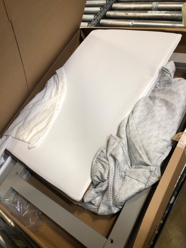 Photo 1 of Delta Children Classic Wood Bedside Bassinet Sleeper - Portable Crib with High-End Wood Frame, Link
USED -MISSING HARDWARE