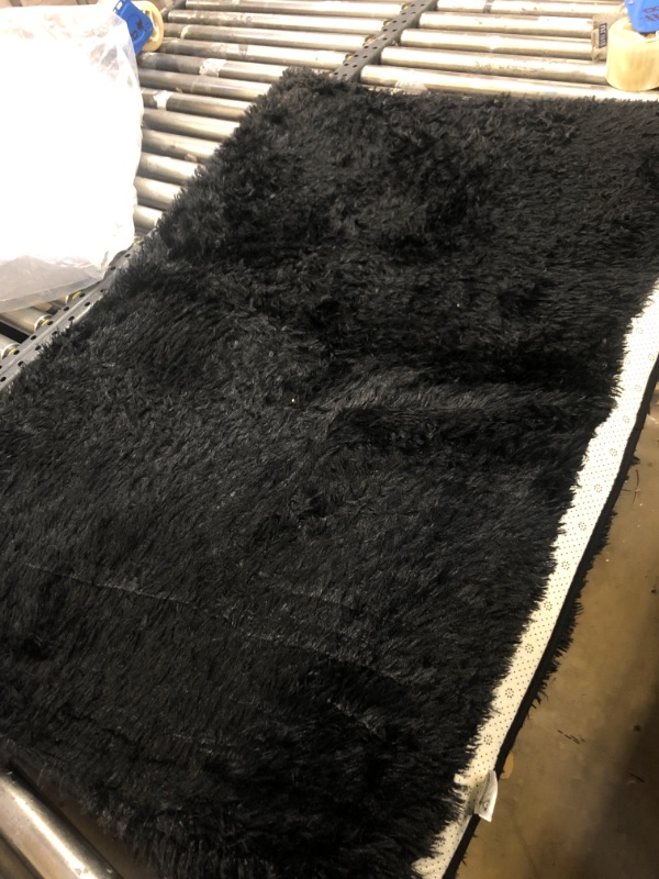 Photo 1 of 48 X 32 AREA RUG BLACK