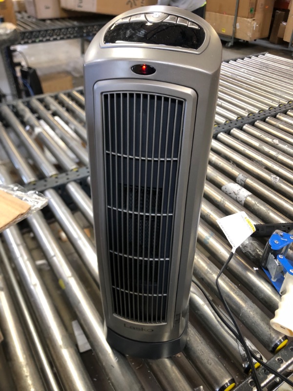 Photo 1 of Lasko Oscillating Digital Ceramic Tower Heater for Home with Adjustable Thermostat, Timer and Remote Control, 23 Inches, 1500W, Silver, 755320