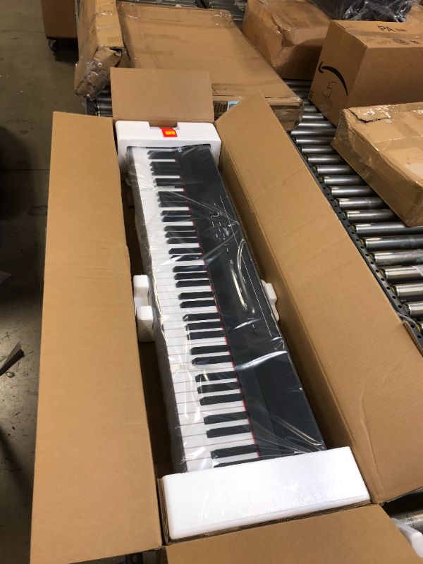 Photo 2 of Alesis Recital – 88 Key Digital Piano Keyboard with Semi Weighted Keys, 2x20W Speakers, 5 Voices, Split, Layer and Lesson Mode, FX and Piano Lessons Recital Piano Only