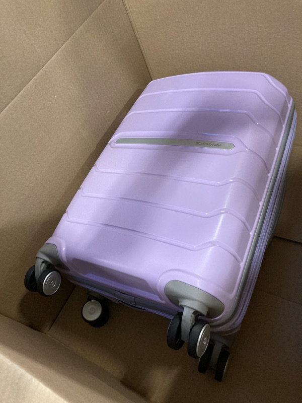 Photo 1 of 22' samsonite light purple hard case luggage 