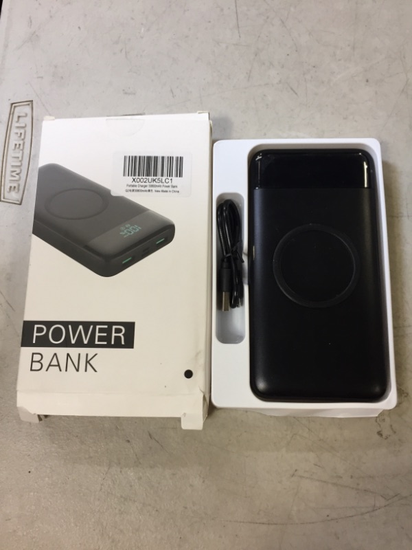 Photo 2 of Wireless Portable Charger 30