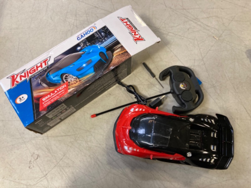 Photo 1 of GaHoo Remote Control Car for Kids - 1/16 Scale Electric Remote Toy Racing, with Led Lights Rechargeable High-Speed Hobby Toy Vehicle, RC Car Gifts for 4 5 6 7 8 9 Years Boys Girls (Red)