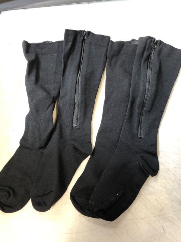 Photo 1 of 2 PAIRS OF OVER THE CALF SOCKS  WITH ZIPPER BLACK 