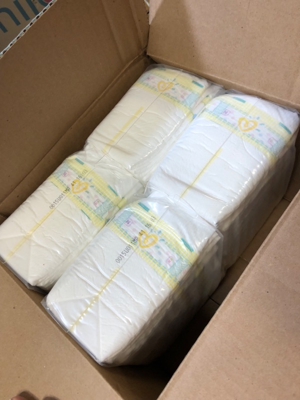 Photo 2 of Baby Diapers Newborn/Size 0 (< 10 lb), 120 Count - Pampers Swaddlers, ONE MONTH SUPPLY (Packaging May Vary) 120 Count (Pack of 1)