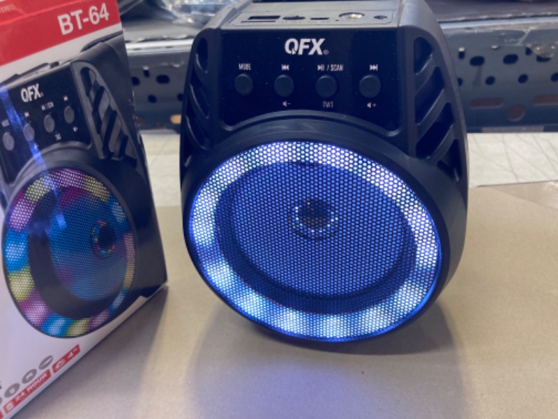 Photo 2 of QFX BT-64 TWS Bluetooth Rechargeable Portable Speaker with 4” Woofer LED Party Lights, Microphone Input, AUX Input, USB Port, TF Card Slot, Black