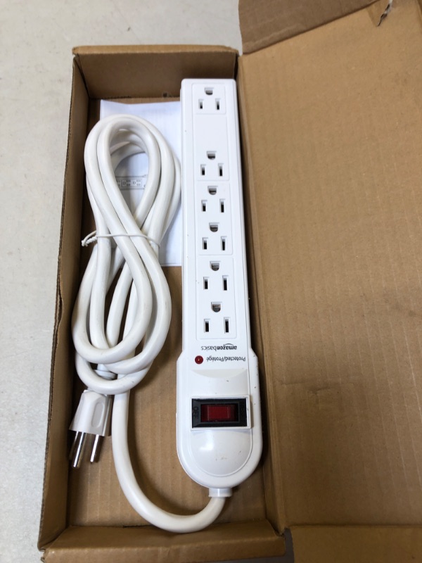 Photo 2 of Amazon Basics 6-Outlet Surge Protector Power Strip, 6-Foot Long Cord, 790 Joule - White White 1-Pack Strip