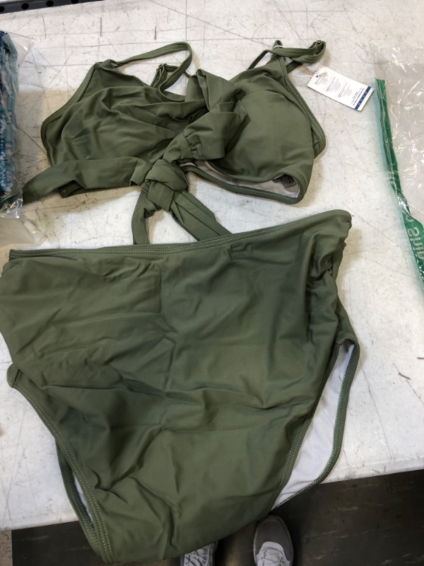 Photo 1 of 2 piece green bathing suit size small 
