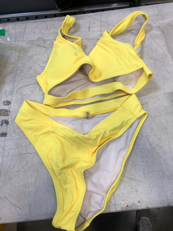 Photo 1 of 2 piece yellow bathing suit size large 