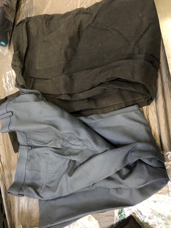 Photo 1 of CLOTHES BAG LOT PANTS 