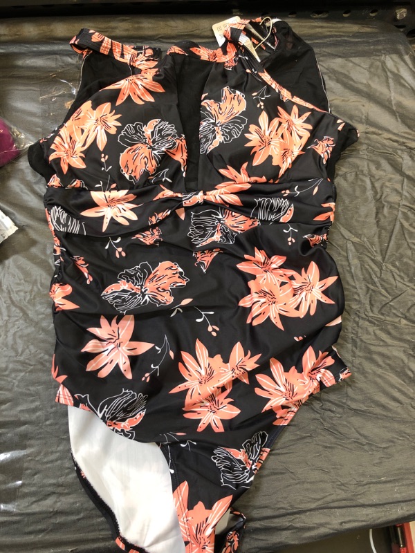 Photo 1 of BLACK FLORAL SWIMSUIT SIZE M/L