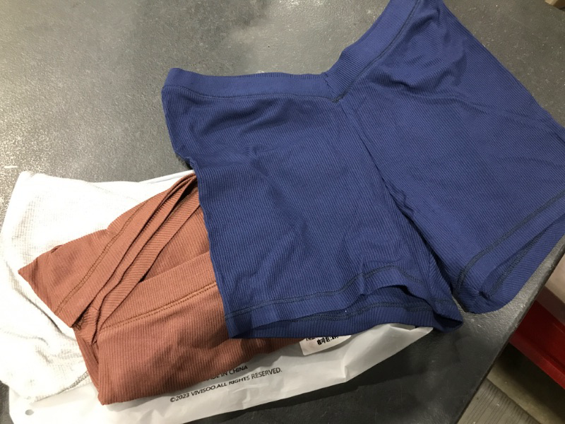 Photo 1 of 3 pairs of medium Brown, Blue, and Gray soft stretchy shorts