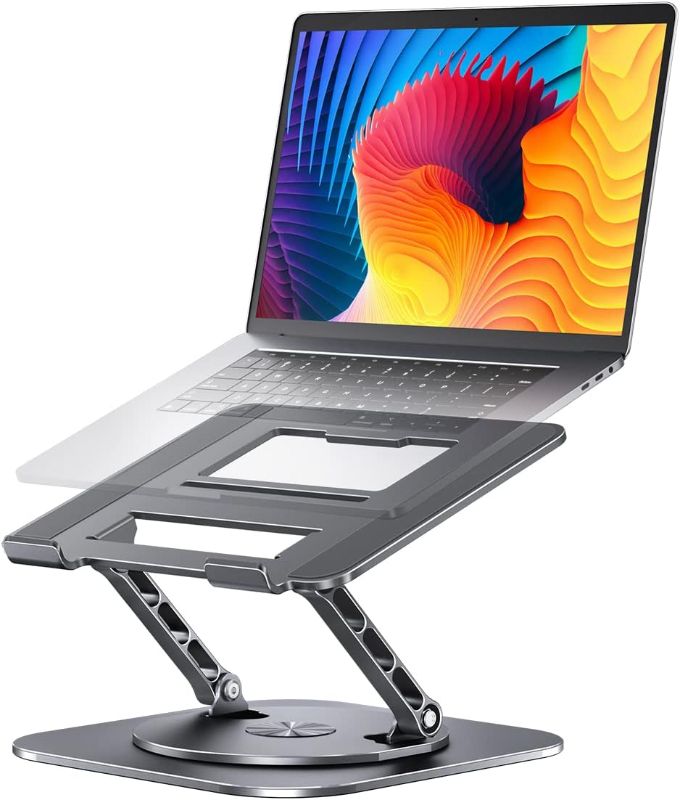 Photo 1 of AOEVI Adjustable Laptop Stand with 360 Rotating Base, Computer Stand for Laptop Ergonimic Foldable Laptop Riser for Desk Compatible with MacBook Pro/Air Notebook up to 16 Inches, Grey 