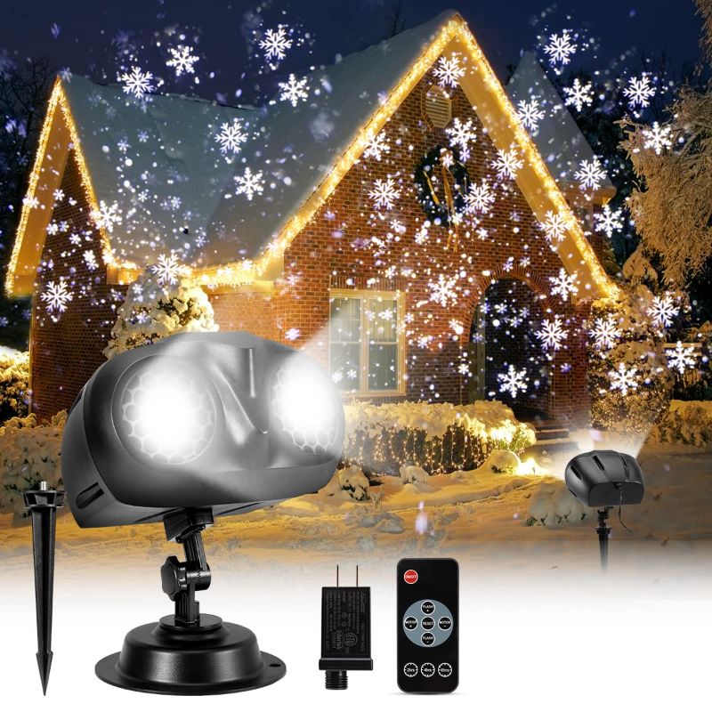 Photo 1 of Christmas Projector Lights Outdoor, Greenclick Upgraded 2-in-1 Rotating Snowflake Projector with Remote Timer IP65 Waterproof LED Christmas Snowfall Projection Lamp for Xmas Holiday House Decoration 23ft