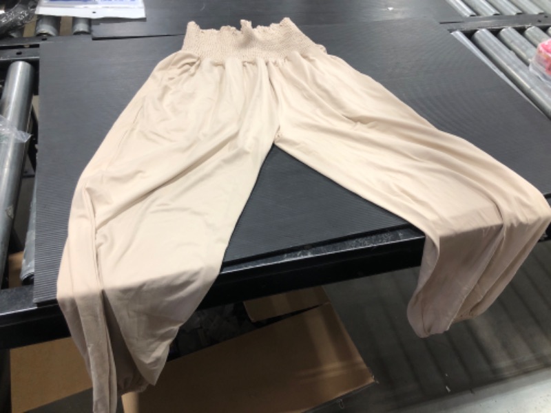 Photo 1 of BEIGE PANT SIZE SMALL 