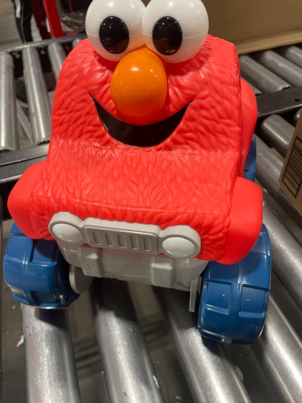 Photo 2 of SESAME STREET Giggle N Go Monster Truck Toy Vehicle, Pops Wheelies, Sings, and Has Phrases, Officially Licensed Kids Toys for Ages 2 Up, Amazon Exclusive