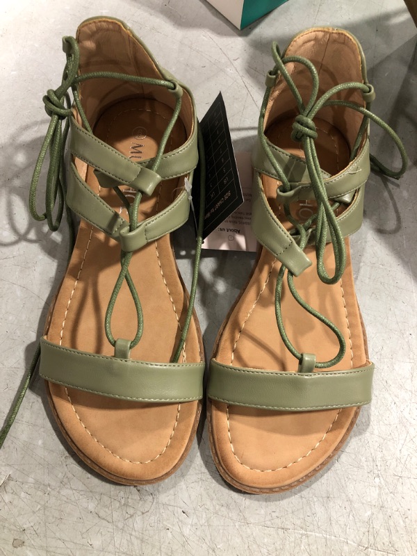 Photo 1 of (6) Flat Wrap Sandals Green