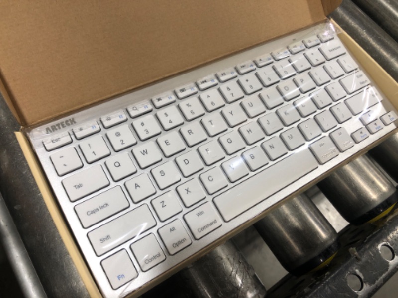 Photo 2 of Arteck Ultra-Slim Bluetooth Keyboard Compatible with iPad 10.2-inch/iPad Air/iPad 9.7-inch/iPad Pro/iPad Mini, iPhone and Other Bluetooth Enabled Devices Including iOS, Android, Windows Silver 