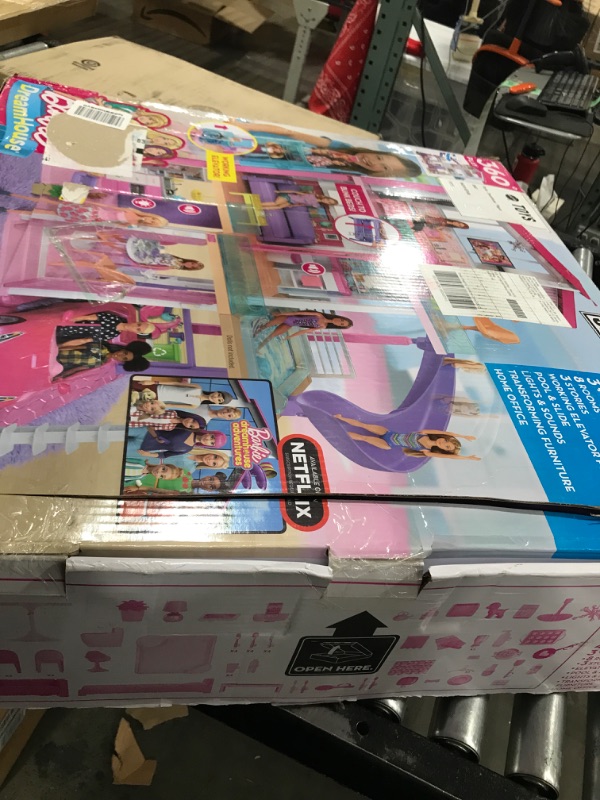 Photo 1 of Barbie Dreamhouse, Doll House Playset with 70+ Accessories Including Transforming Furniture, Elevator, Slide, Lights & Sounds Wheelchair Accessible Elevator