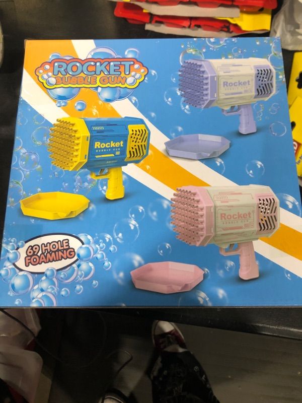 Photo 1 of Bubble Gun Rocket 69 Holes Soap Blaster Machine, Bazooka Bubble Launcher Blower Toys for Kids Outdoor Indoor, Bubble Maker for Party Birthday Wedding(Purple)