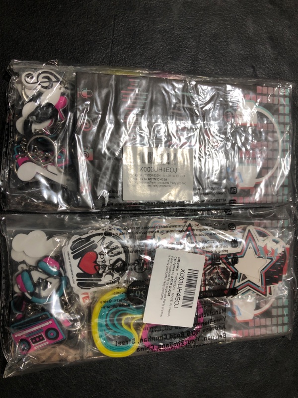 Photo 2 of Geyoga 158 Pcs Music Party Favors Music Themed for 18 Stickers Silicone Bracelets Keychain Pin Badges Luminous Tattoo Sticker Organza Bag Musical Cards for Teens Holiday Birthday Social Dance Party (pack of 2)