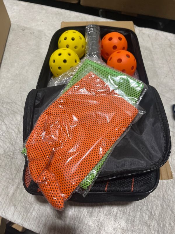 Photo 2 of OrenHomy Pickleball Paddles, Pickleball Set Include 2 Fiberglass Honeycomb Core Rackets, 4 Pickleball Balls, 2 Cooling Towels, 1 Carry Bag, Gifts for Men Women
