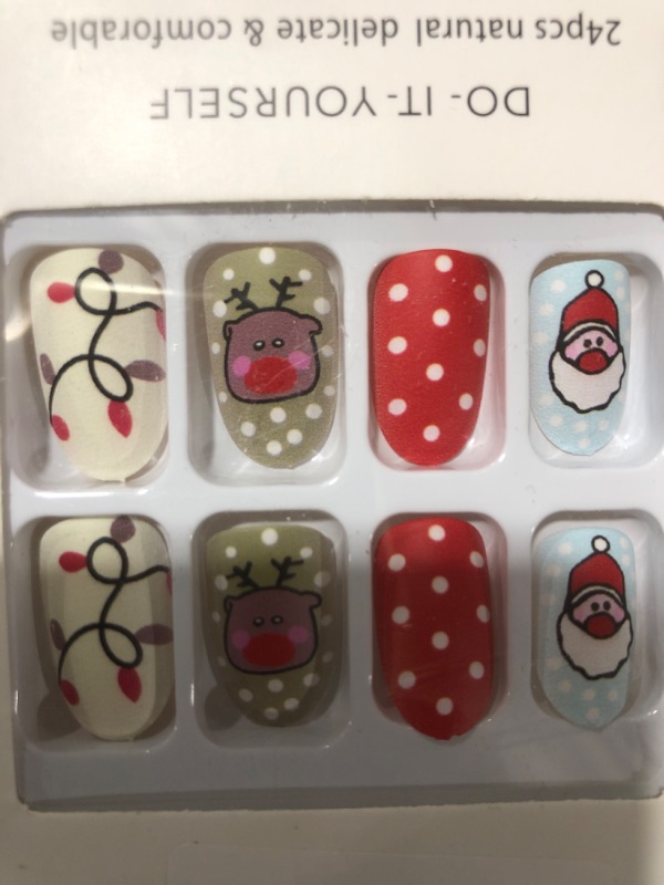 Photo 2 of CHRISTMAS HOLIDAY NAILS 24 PIECE 
SANTA AND RUDOLPH NAILS
NAIL GLUE NOT INCLUDED