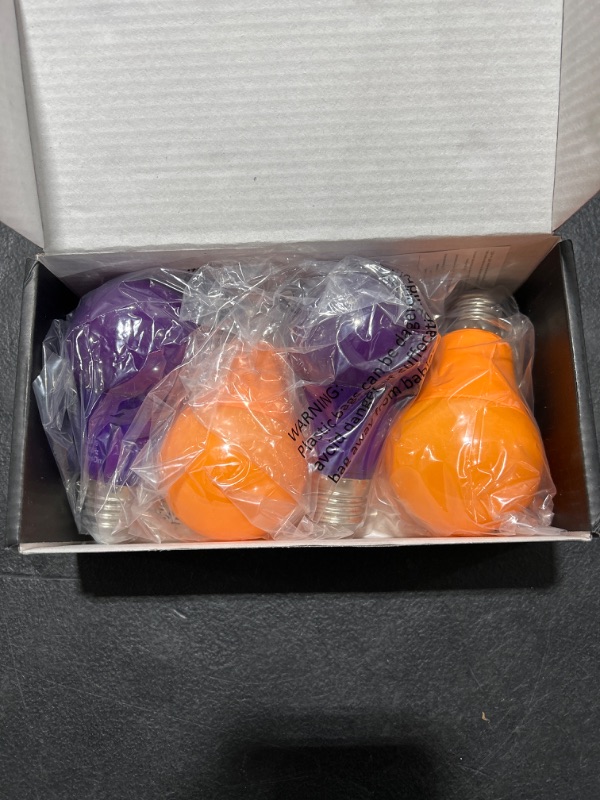 Photo 1 of 4 PACK PURPLE AND ORANGE LED A19 LIGHT BULB