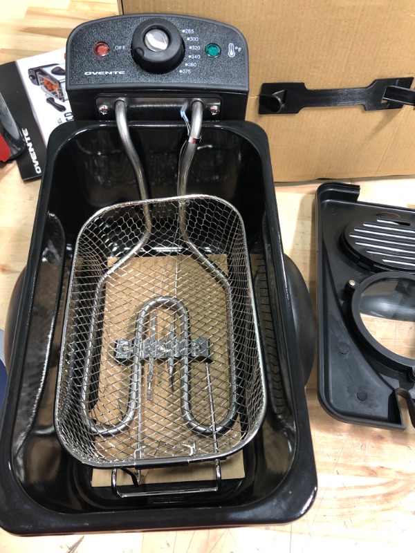 Photo 2 of *****MISSING FRY BASKET HANDLE TESTED FUNCTIONAL***

Ovente Electric Deep Fryer 2 Liter Capacity, 1500W with Lid, Viewing Window, Adjustable Temperature Knob and Stainless Steel Frying Basket Perfect for Fried Chicken, Nuggets & Fries, Silver FDM2201BR Si