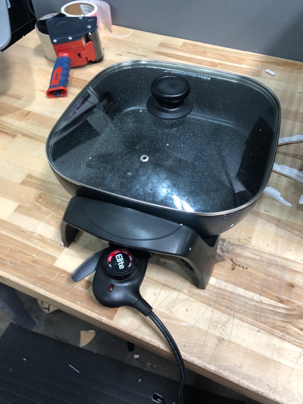 Photo 2 of ***DAMGED TEMPTURE KNOB POPPED OFF ****TESTED FUNCTIONAL ***
Elite Gourmet EG6201 Extra Deep 12"x12"x3.2" (7.5Qt.) Scratch Resistant Dishwasher Safe, Non-stick Electric Skillet with Glass Vented Lid, Adjustable Temperature, Black 7.5 Quart