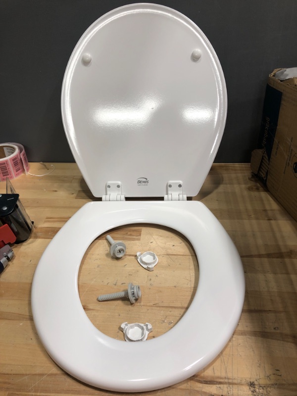 Photo 2 of *** NEW OPENED BOX MAY BE MISSING HARDWARE**
Bemis 500EC 390 Toilet Seat with Easy Clean & Change Hinges, Round, Durable Enameled Wood, Cotton White Cotton White 1 Pack Round Toilet Seat
