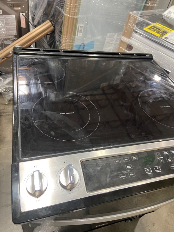 Photo 5 of (NEEDS REPAIRS)Whirlpool 30-in Smooth Surface 4 Elements 4.8-cu ft Self-Cleaning Slide-in Electric Range