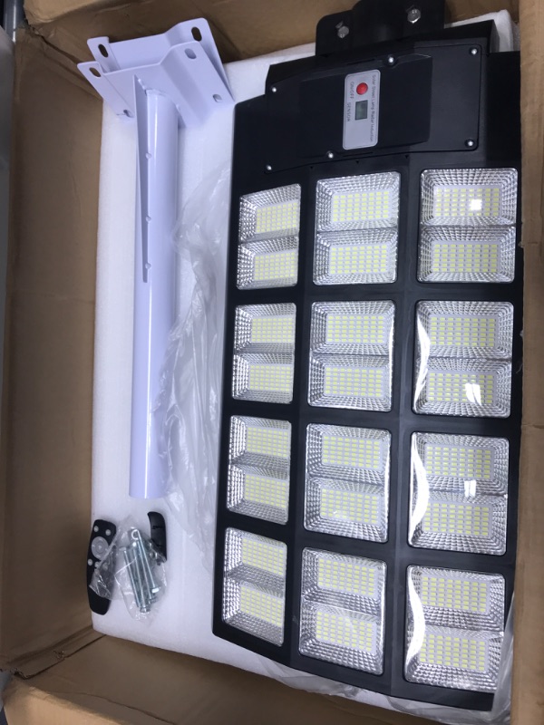 Photo 2 of wudor 2 Pack 1200W Solar Street Lights Outdoor , 1,152 LED Ultra Bright Waterproof Street Light, 120,000LM White Light Dusk to Dawn, with Motion Sensor and Remote Control, for Parking Lots, etc.