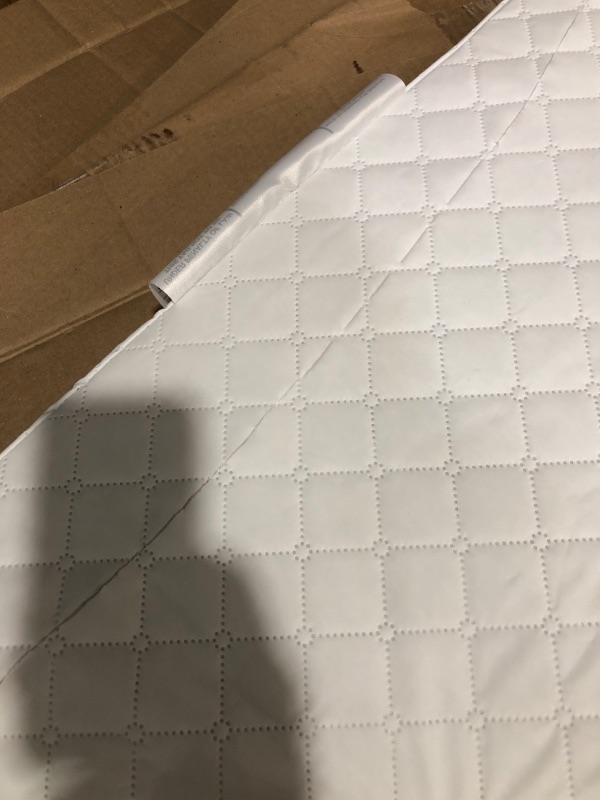 Photo 3 of * item damaged * see images *
dream on me portable mattress 
