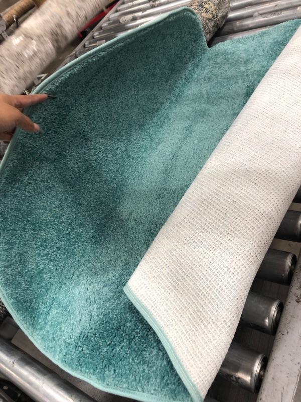 Photo 1 of 4'10" turquoise oval rug 