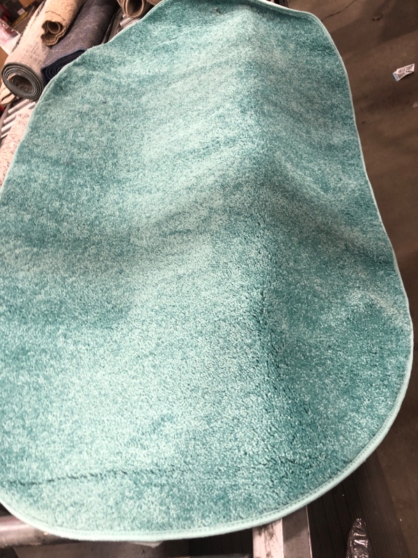 Photo 1 of 4'10" turquoise oval rug 