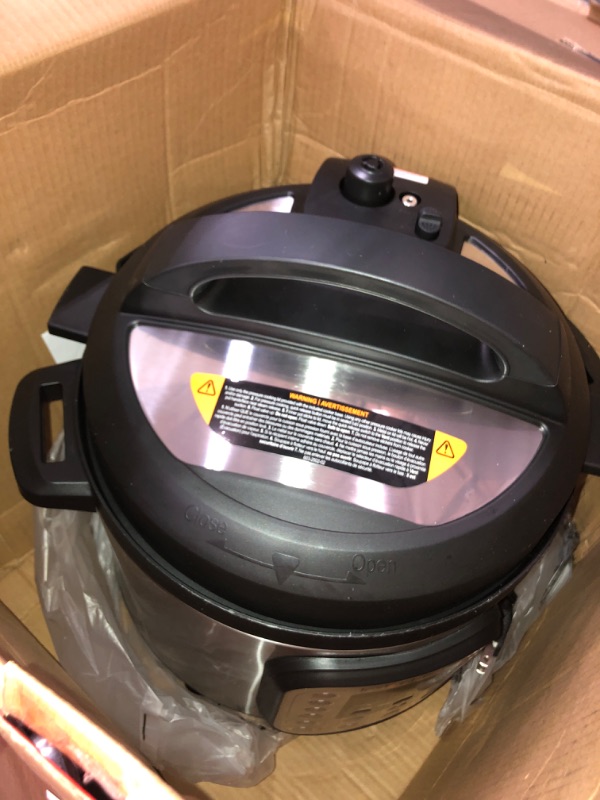 Photo 2 of * used * damaged * see all images *
Instant Pot Duo 7-in-1 Electric Pressure Cooker, Slow Cooker, Rice Cooker, Steamer, 