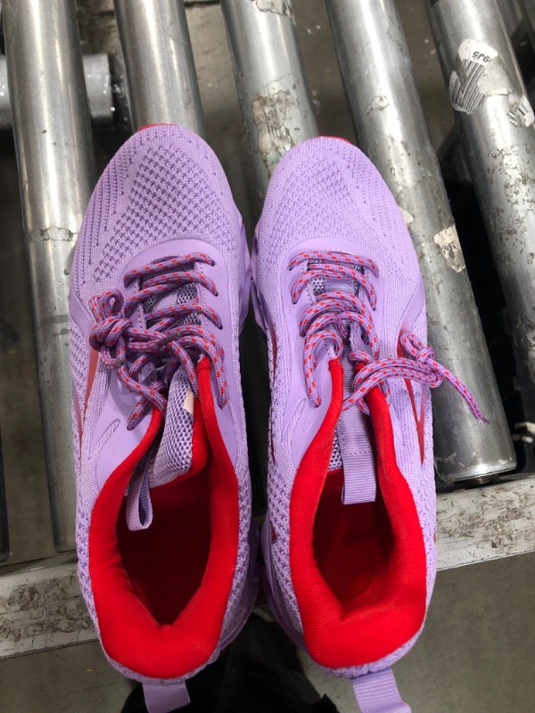 Photo 1 of Purple running shoes size 8.5  women 