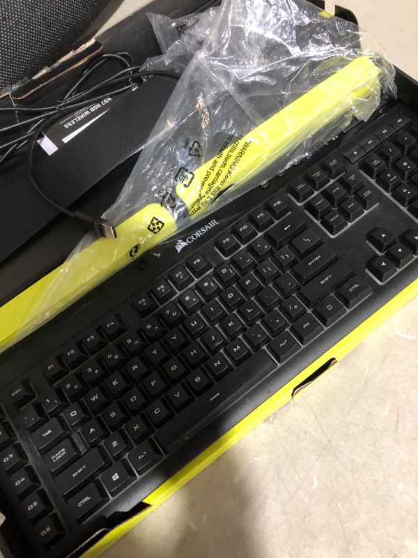 Photo 2 of * used item * lights up * wont type * sold for parts * 
CORSAIR K57 RGB Wireless Gaming Keyboard, Black & MM800 Polaris RGB Mouse Pad 